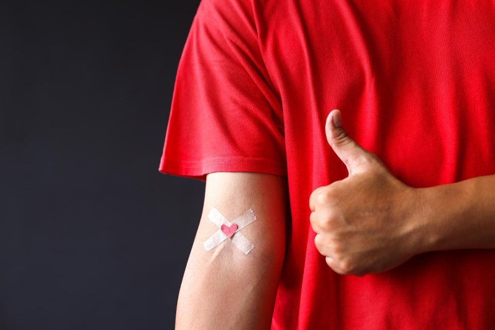 man_with_plaster_on_hand