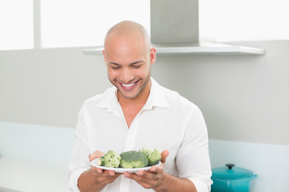 bald_man_eating_healthy_beforehair_transplant_in_turkey