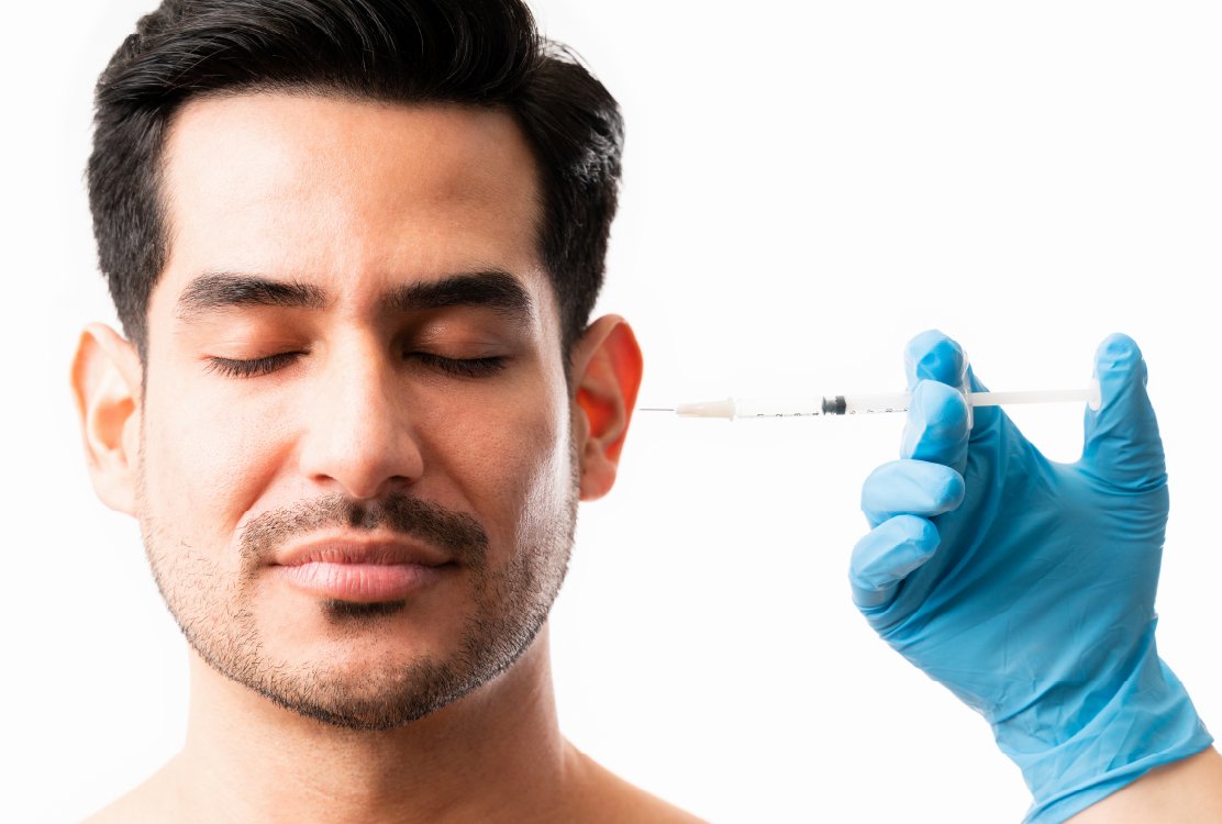 man_getting_fillers_before_pillow_face