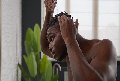 man_noticing_afro_hair_texture_change