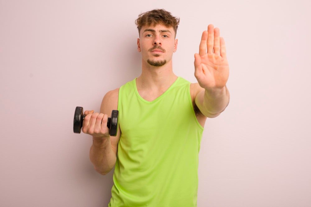 man_saying_no_to_extreme_workouts