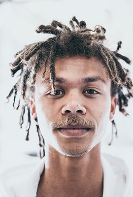 man_with_beautiful_hairstyle_after_afro_hair_transplant_in_turkey