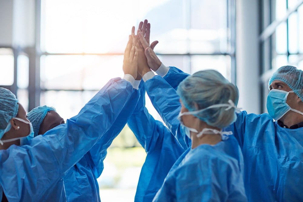 surgeons_giving_high_five_after_a_good_job