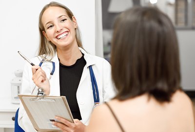 woman_consulting_with_doctor_before_labiaplasty_in_turkey