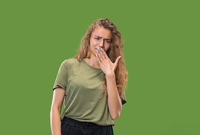 woman_covering_nose_due_to_bad_smells