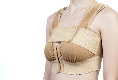 woman_with_compression_garment_after_breast_augmentation