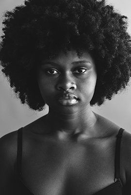 woman_with_full_afro_hair_after_afro_hair_transplant_in_turkey
