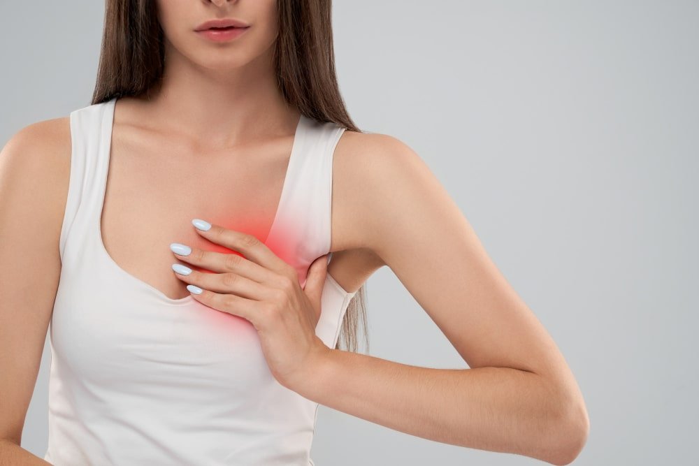 woman_with_mild_pain_after_breast_lift_in_turkey